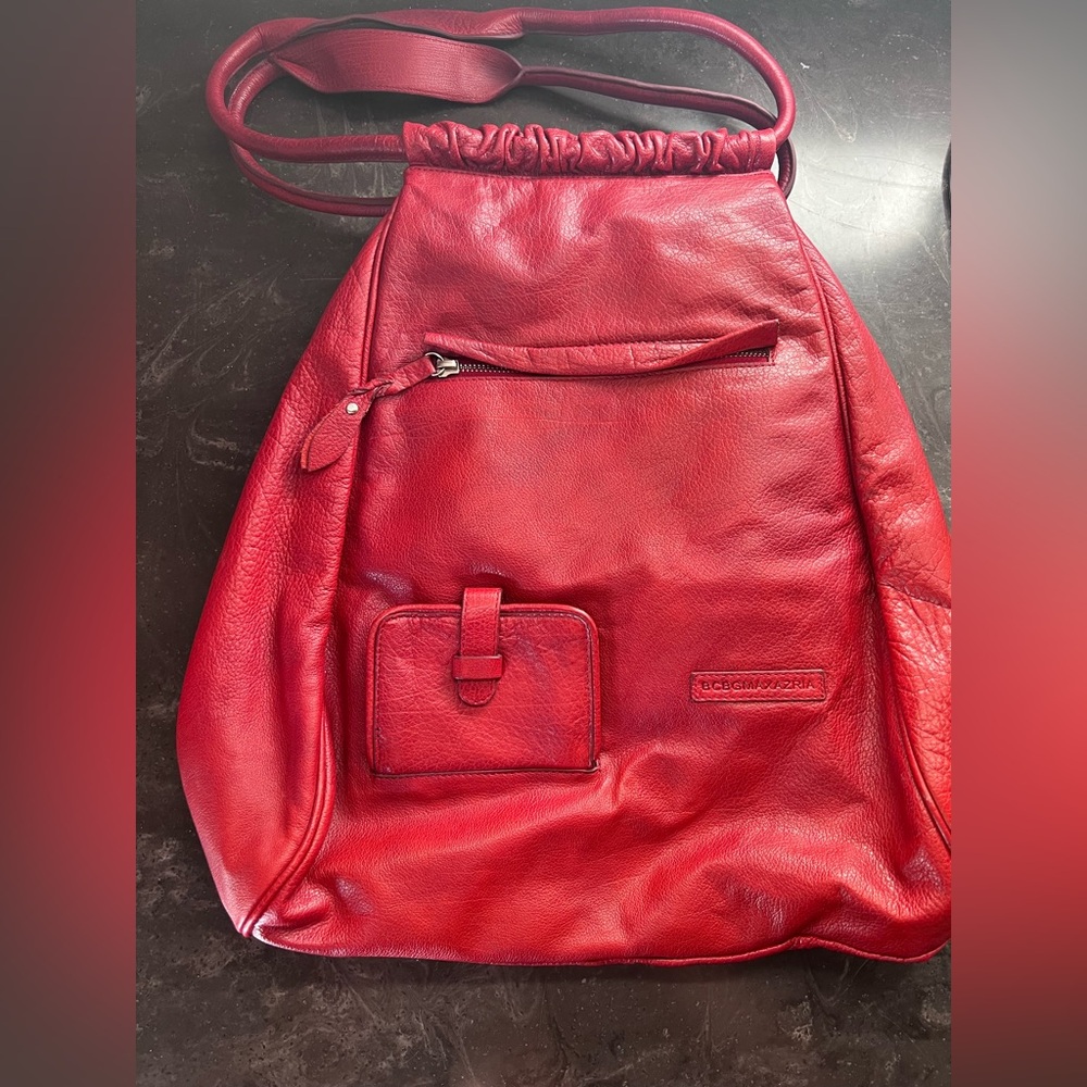 BCBG Leather red purse. Never used, lining is 100% clean.
